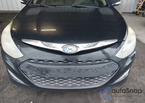 2013 Hyundai Sonata Hybrid Limited z USA, uszkodzony, nr VIN KMHEC4A49DA074194